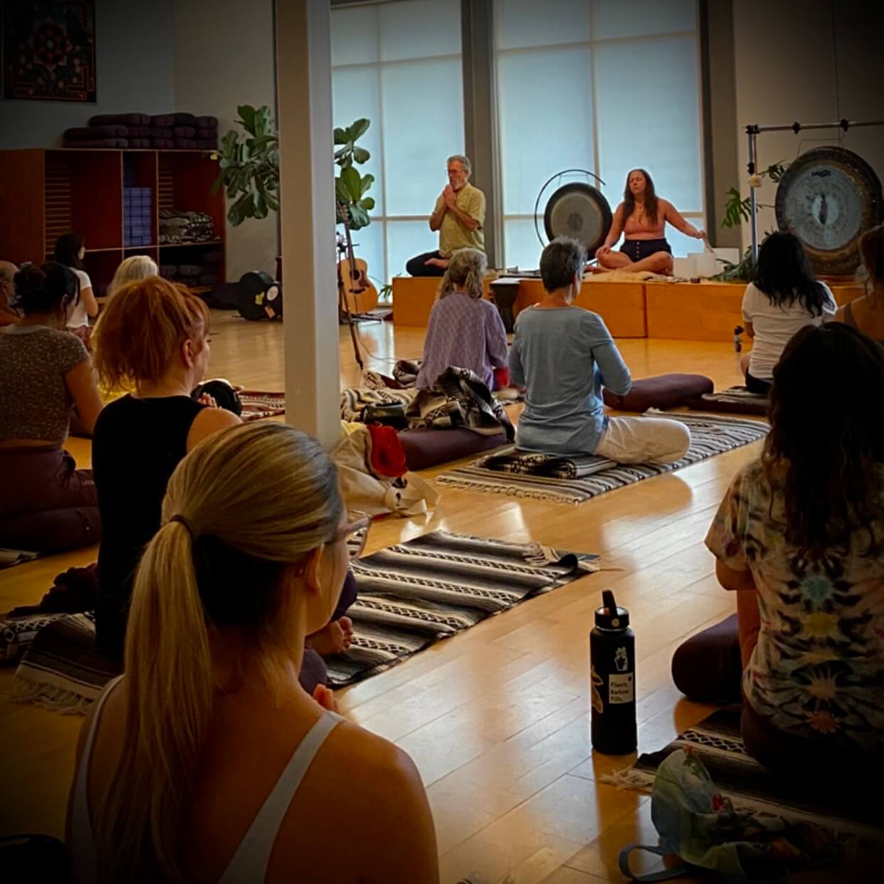 Ray and Tej hosting a sound healing event at Flow Yoga in Austin, Texas